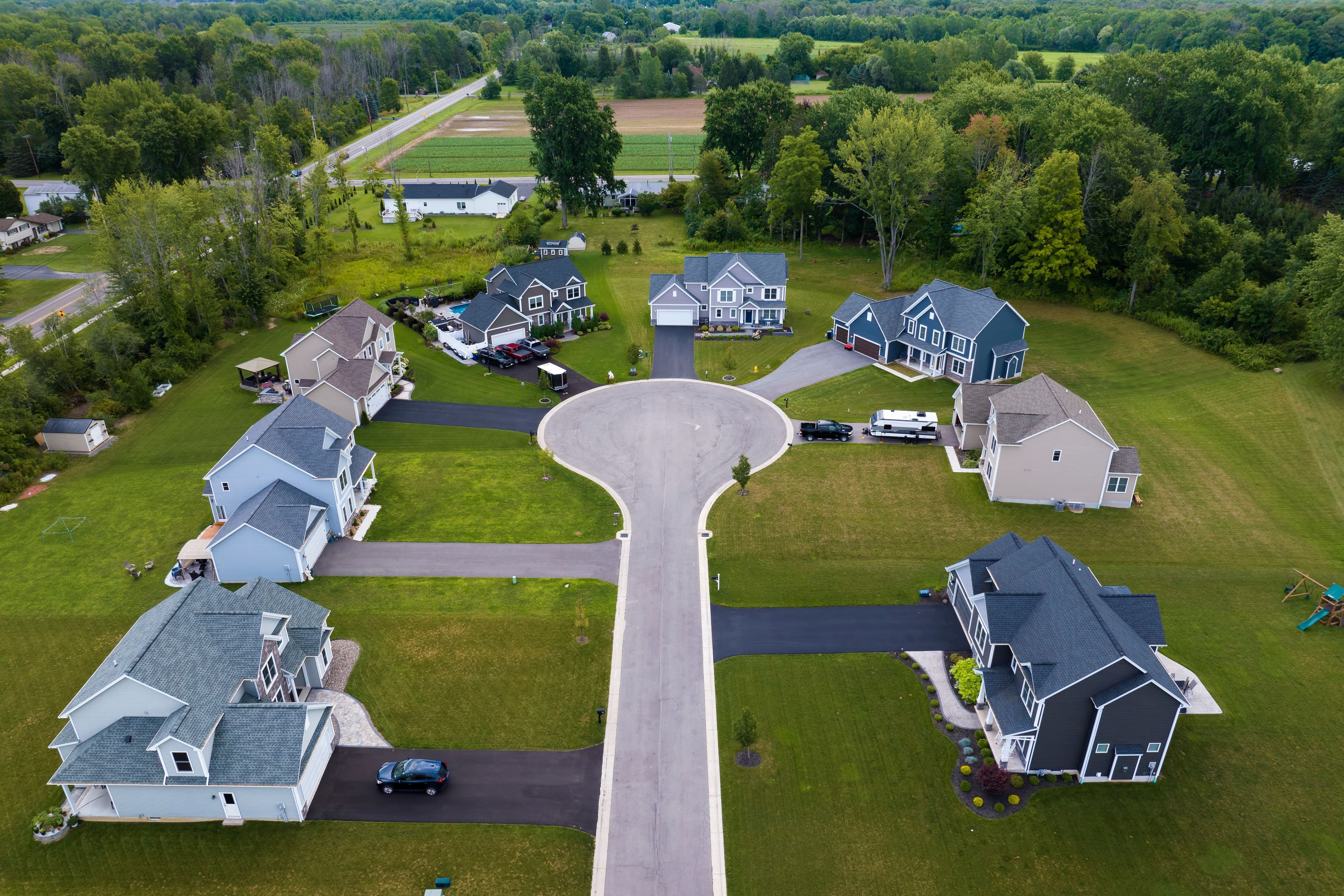 Aerial view of large private homes in Rochester, NY residential area.