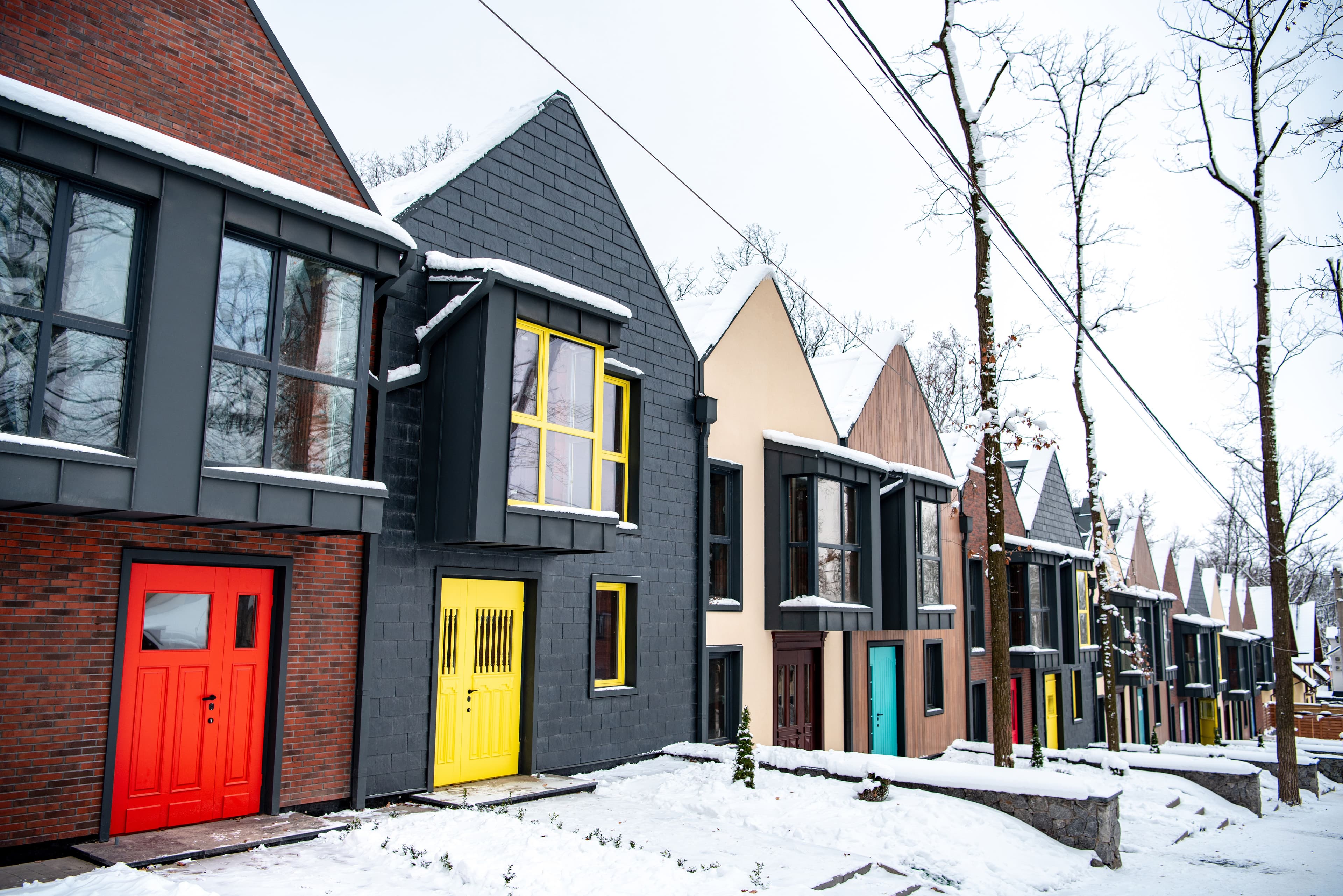 Colorful Row Houses in Winter Snowy Subdivision
