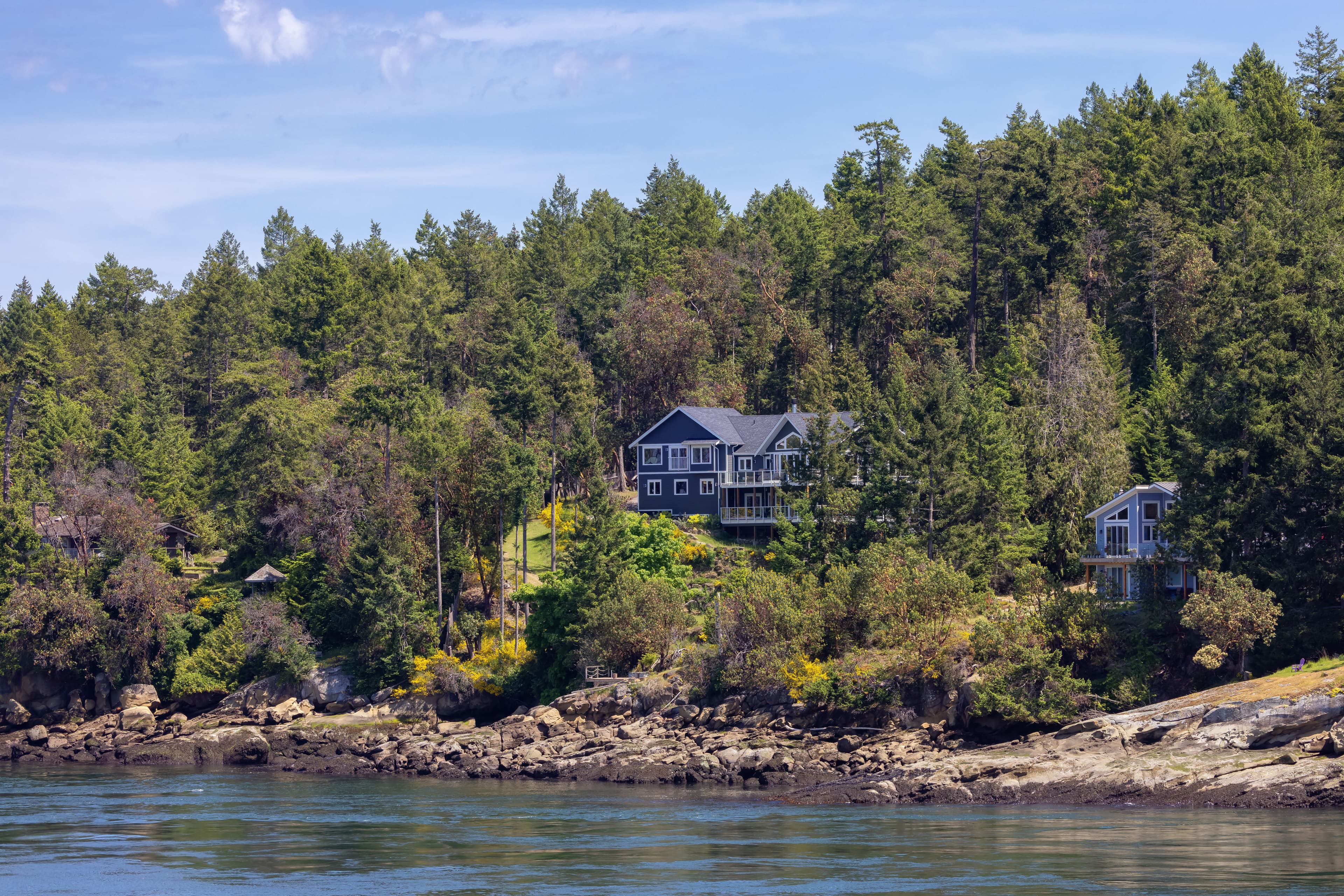 Cabin on a Rocky Shore on the West Coast of Pacific Ocean. Canadian Nature Background.